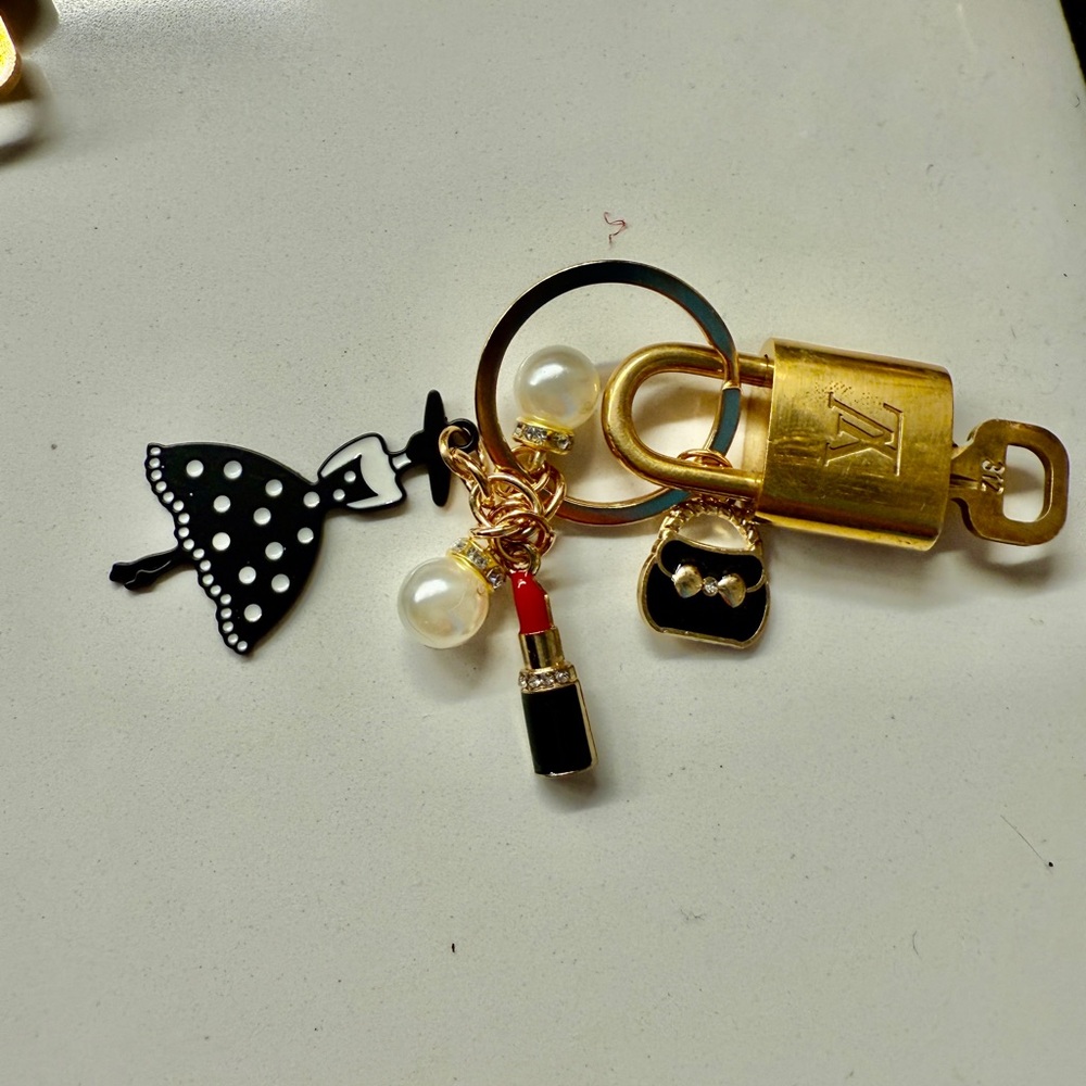 Louis Vuitton padlock and key/bag charm